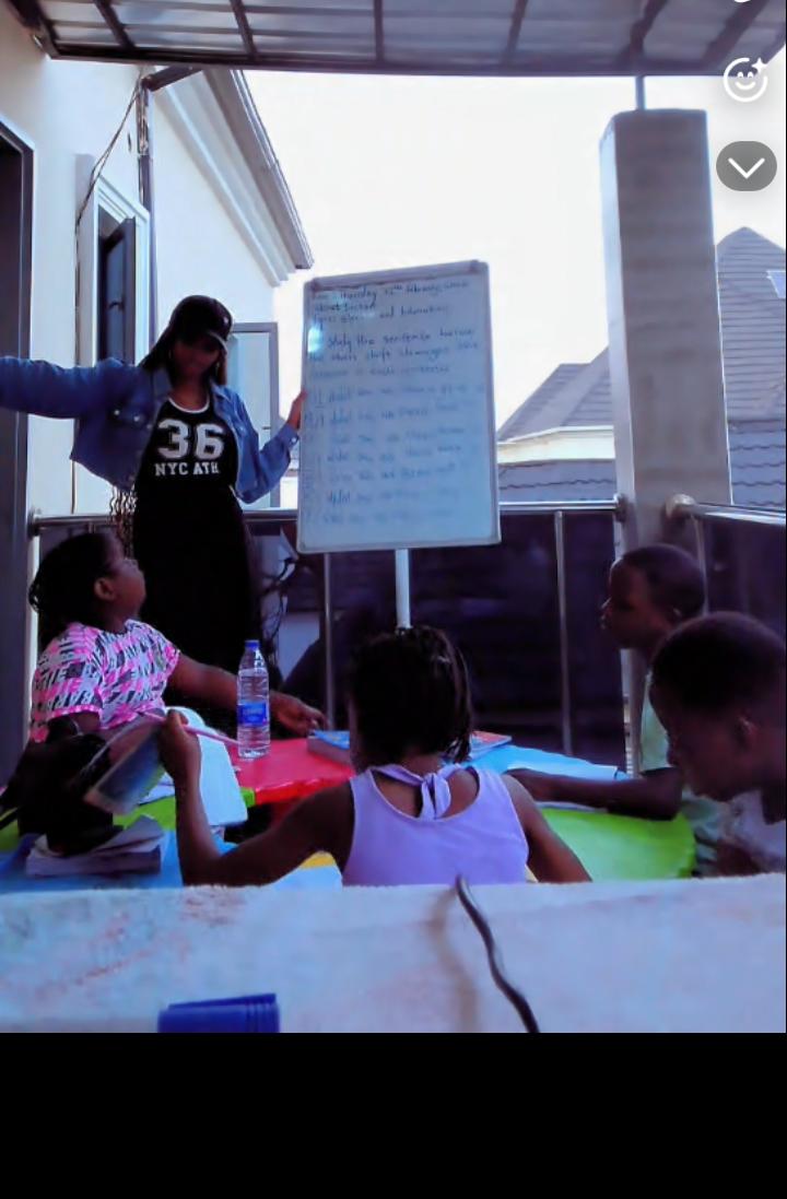 Amuche Bells teaching students